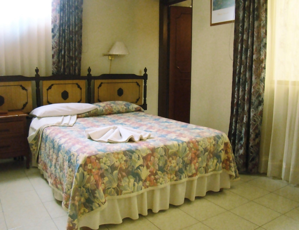 Imagen de la habitación del Hotel Hotel Posada La Fuente. Foto 12