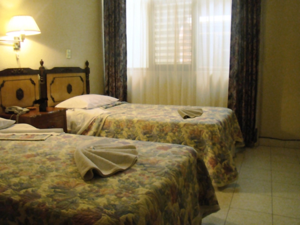 Imagen de la habitación del Hotel Hotel Posada La Fuente. Foto 13