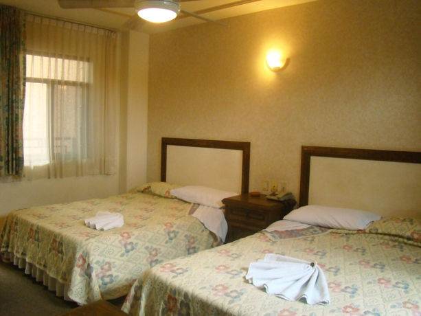 Imagen de la habitación del Hotel Hotel Posada La Fuente. Foto 14