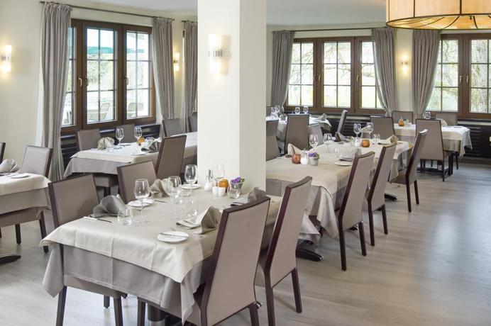 Imagen del bar/restaurante del Hotel Hotel Restaurant Dimmer. Foto 2
