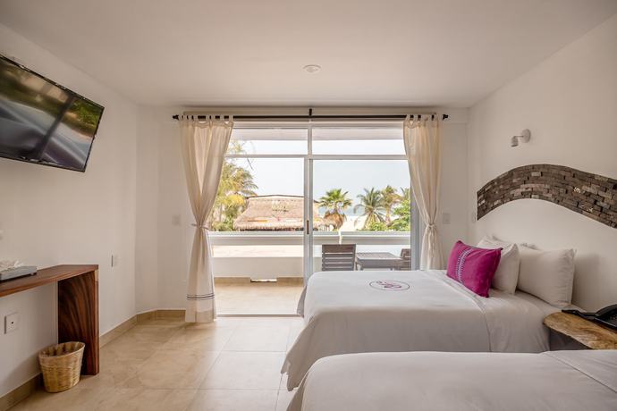 Imagen de la habitación del Hotel Hotel Rockaway. Foto 16