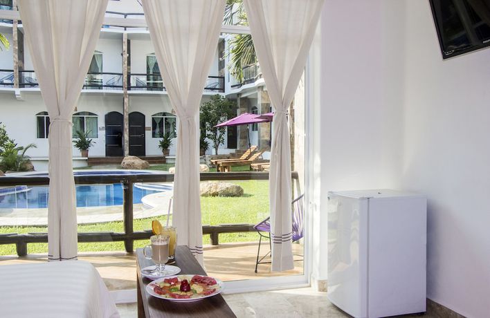 Imagen de la habitación del Hotel Hotel Rockaway. Foto 18