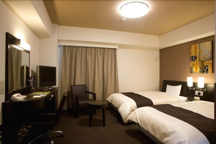Imagen de la habitación del Hotel Hotel Route-Inn Hofu Ekimae. Foto 6
