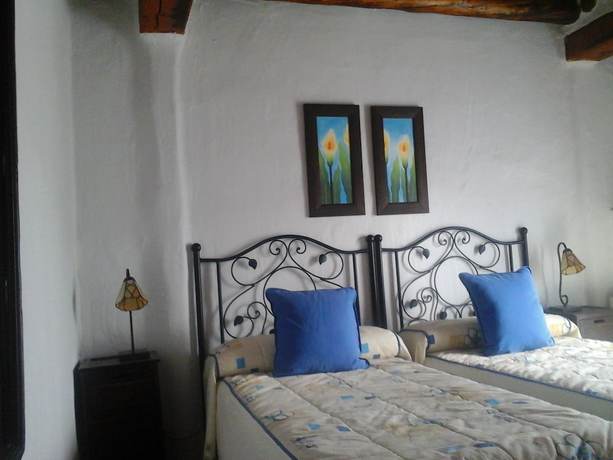 Imagen de la habitación del Hotel Hotel Rural Restaurante La Posada de los Vientos. Foto 8