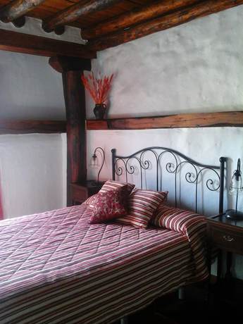 Imagen de la habitación del Hotel Hotel Rural Restaurante La Posada de los Vientos. Foto 10