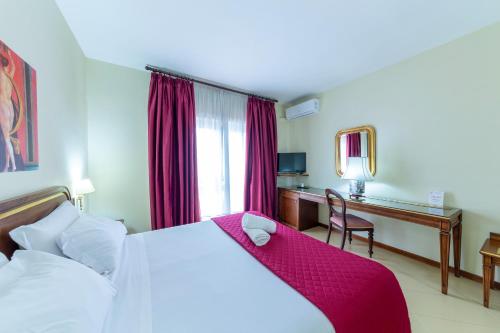 Imagen de la habitación del Hotel Hotel Sakura. Foto 18