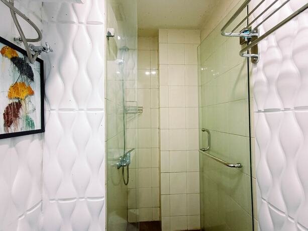 Imagen de la habitación del Hotel Hotel Sanrina Makassar. Foto 11