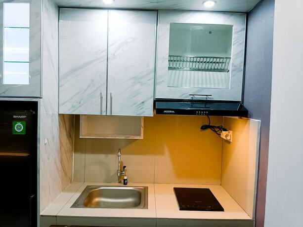 Imagen de la habitación del Hotel Hotel Sanrina Makassar. Foto 15