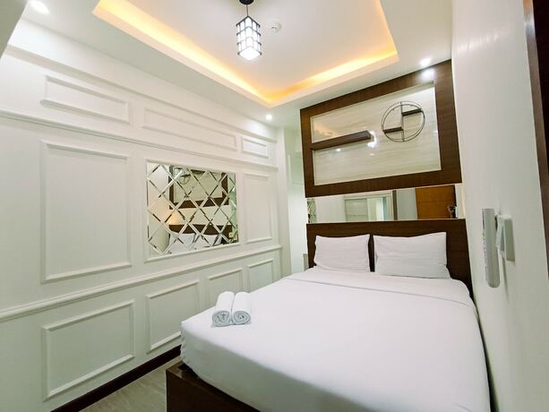 Imagen de la habitación del Hotel Hotel Sanrina Makassar. Foto 16