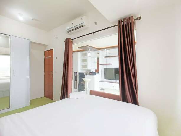 Imagen de la habitación del Hotel Hotel Sanrina Makassar. Foto 23