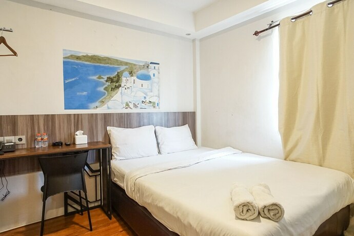 Imagen de la habitación del Hotel Hotel Sanrina Makassar. Foto 24