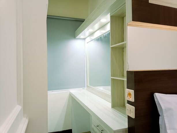 Imagen de la habitación del Hotel Hotel Sanrina Makassar. Foto 25