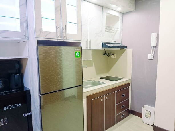 Imagen de la habitación del Hotel Hotel Sanrina Makassar. Foto 33