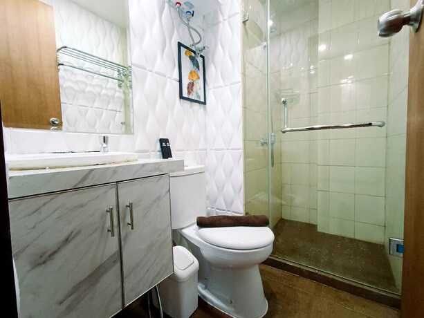 Imagen de la habitación del Hotel Hotel Sanrina Makassar. Foto 39