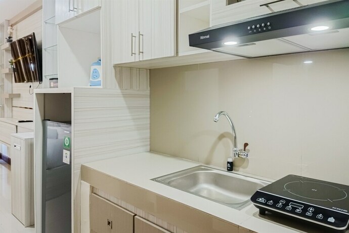 Imagen de la habitación del Hotel Hotel Sanrina Makassar. Foto 42