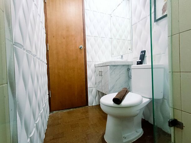 Imagen de la habitación del Hotel Hotel Sanrina Makassar. Foto 46