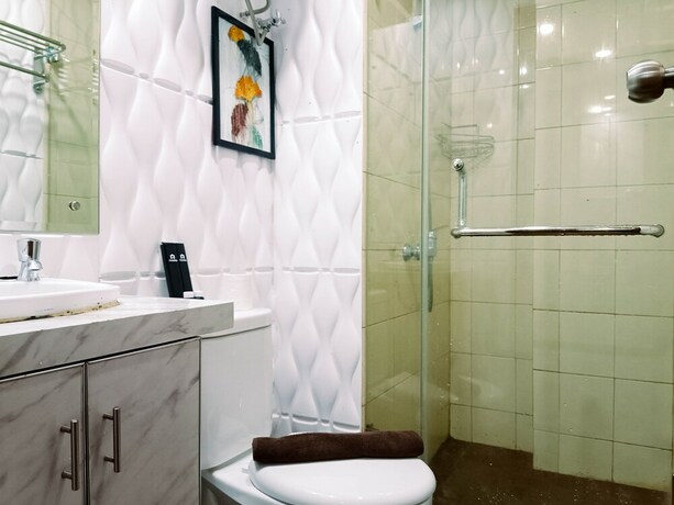 Imagen de la habitación del Hotel Hotel Sanrina Makassar. Foto 52