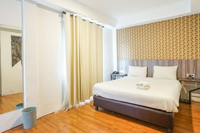 Imagen de la habitación del Hotel Hotel Sanrina Makassar. Foto 57