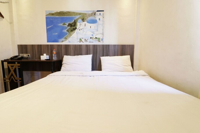 Imagen de la habitación del Hotel Hotel Sanrina Makassar. Foto 58