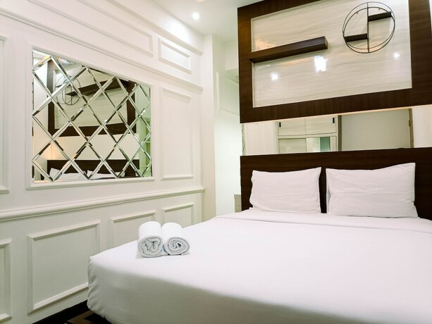 Imagen de la habitación del Hotel Hotel Sanrina Makassar. Foto 59