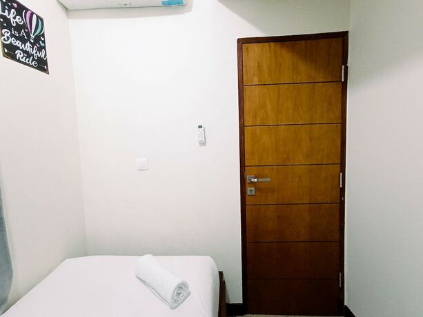 Imagen de la habitación del Hotel Hotel Sanrina Makassar. Foto 64