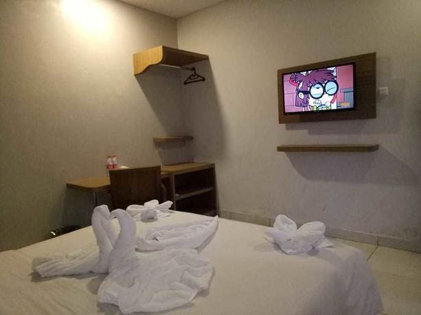 Imagen de la habitación del Hotel Hotel Sonic Airport Semarang. Foto 9