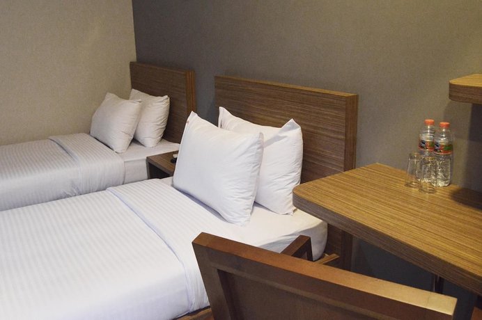 Imagen de la habitación del Hotel Hotel Sonic Airport Semarang. Foto 10