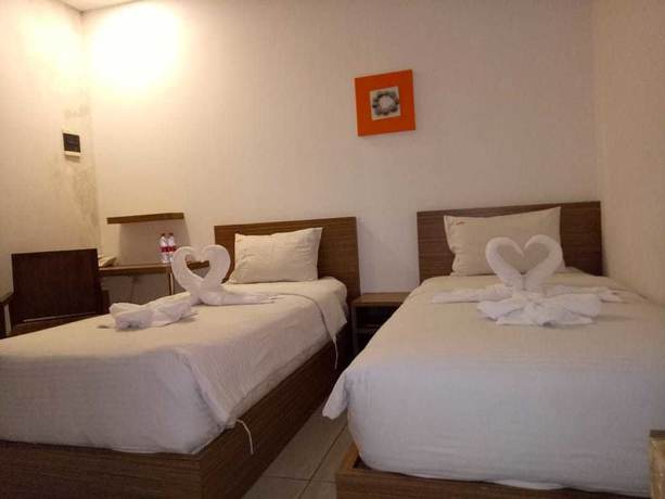 Imagen de la habitación del Hotel Hotel Sonic Airport Semarang. Foto 12
