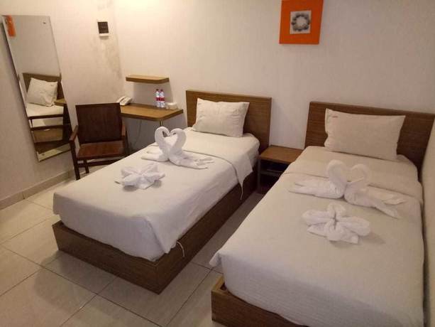Imagen de la habitación del Hotel Hotel Sonic Airport Semarang. Foto 15