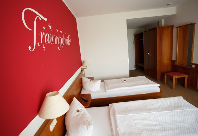 Imagen de la habitación del Hotel Hotel Sportwelt. Foto 17