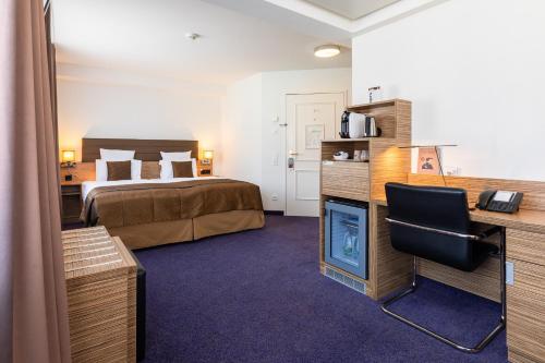 Imagen de la habitación del Hotel Hotel Stoller. Foto 16