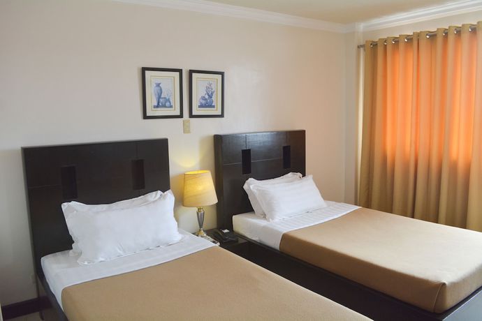 Imagen de la habitación del Hotel Hotel Tavern Surigao. Foto 7