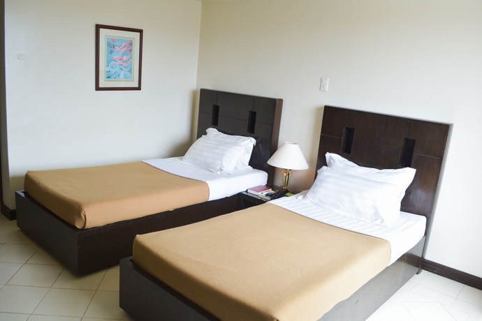 Imagen de la habitación del Hotel Hotel Tavern Surigao. Foto 12