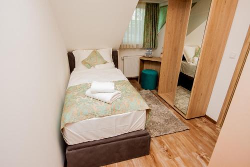 Imagen de la habitación del Hotel Hotel Tiffany. Foto 9