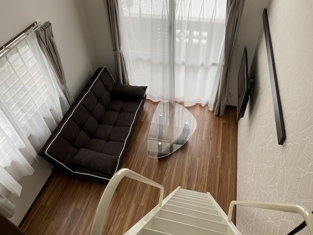 Imagen de la habitación del Hotel Hotel Tomas Makiminato Villa. Foto 12