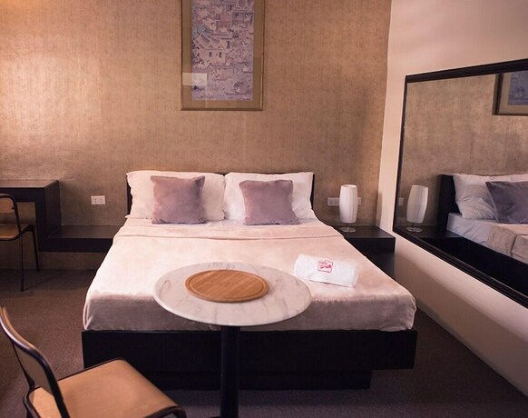 Imagen de la habitación del Hotel Hotel Turista Canlubang. Foto 22