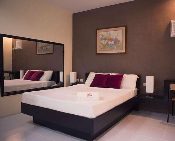 Imagen de la habitación del Hotel Hotel Turista Canlubang. Foto 24