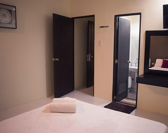 Imagen de la habitación del Hotel Hotel Turista Canlubang. Foto 27
