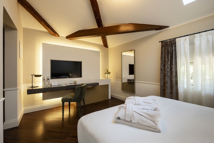 Imagen de la habitación del Hotel Hotel Villa Soligo - Small Luxury Hotels Of The World. Foto 11