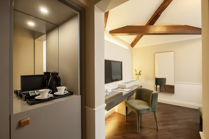 Imagen de la habitación del Hotel Hotel Villa Soligo - Small Luxury Hotels Of The World. Foto 13