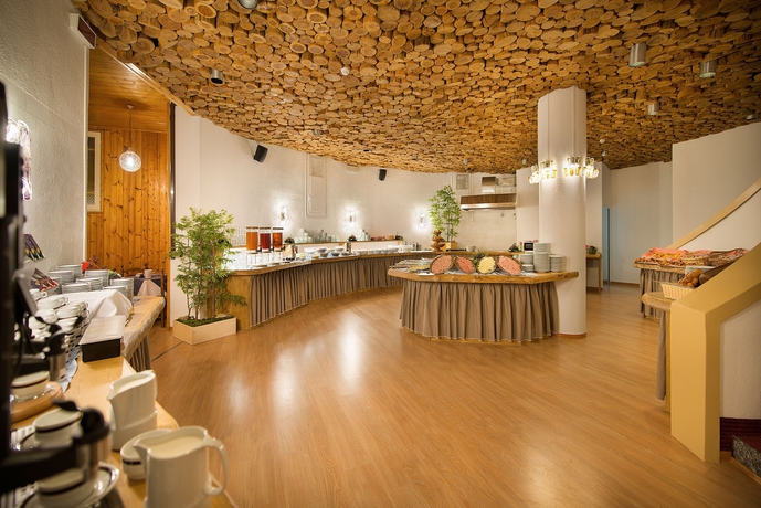 Imagen del bar/restaurante del Hotel Hotel Villaggio San Carlo. Foto 5