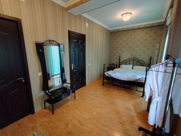 Imagen de la habitación del Hotel Hotel White Magnolia. Foto 3