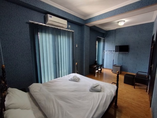 Imagen de la habitación del Hotel Hotel White Magnolia. Foto 4