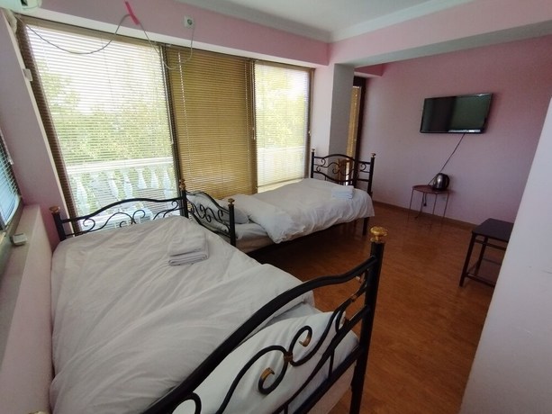 Imagen de la habitación del Hotel Hotel White Magnolia. Foto 5