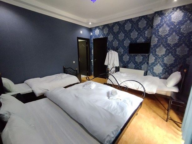 Imagen de la habitación del Hotel Hotel White Magnolia. Foto 6