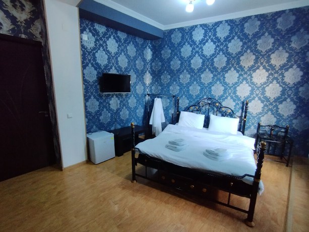 Imagen de la habitación del Hotel Hotel White Magnolia. Foto 8