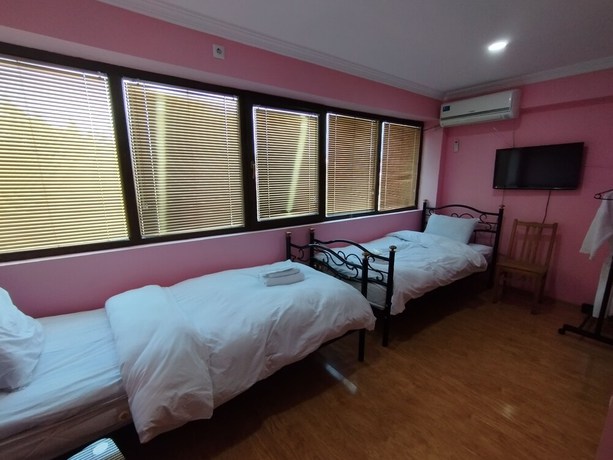 Imagen de la habitación del Hotel Hotel White Magnolia. Foto 13