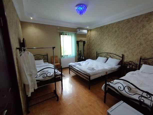 Imagen de la habitación del Hotel Hotel White Magnolia. Foto 15