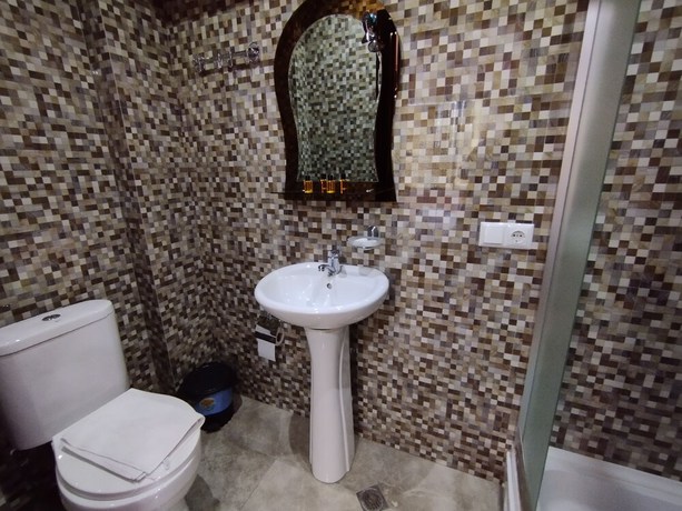 Imagen de la habitación del Hotel Hotel White Magnolia. Foto 16
