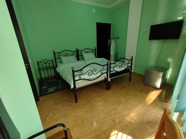 Imagen de la habitación del Hotel Hotel White Magnolia. Foto 17